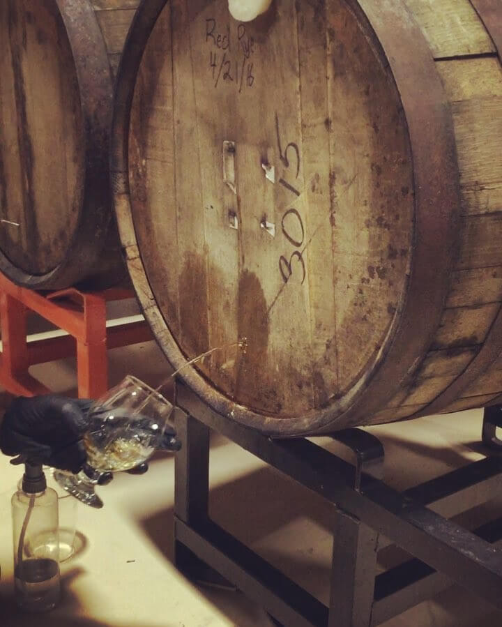Straight from the bottom of the barrel! @nicosoulias is checking on our #barrelaged #beer we did with @toronado_seattle and it's tasting amazing so far!